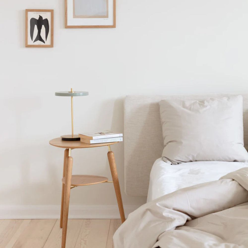 Umage Asteria Move Portable Table Lamp In Nuance Olive And Brass lifestyle